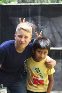 Clayton having fun with a Guatemalan boy